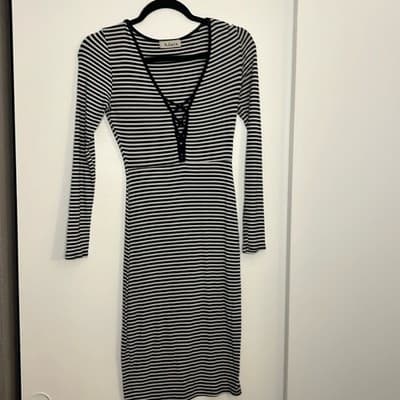 Adara blue and white horizontal striped tight fitting above the knee dress