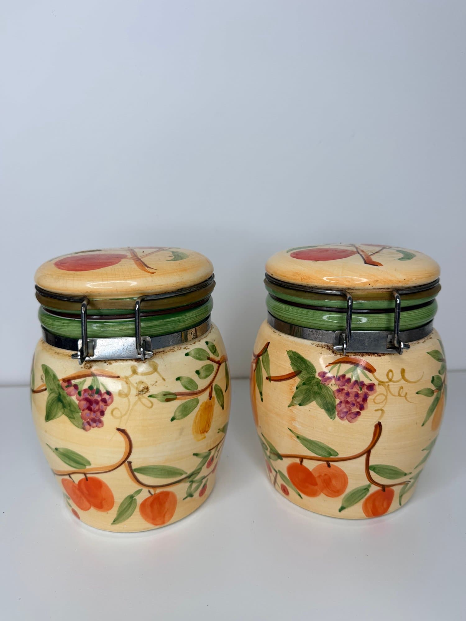 Hand painted ceramic canister set with fruit design